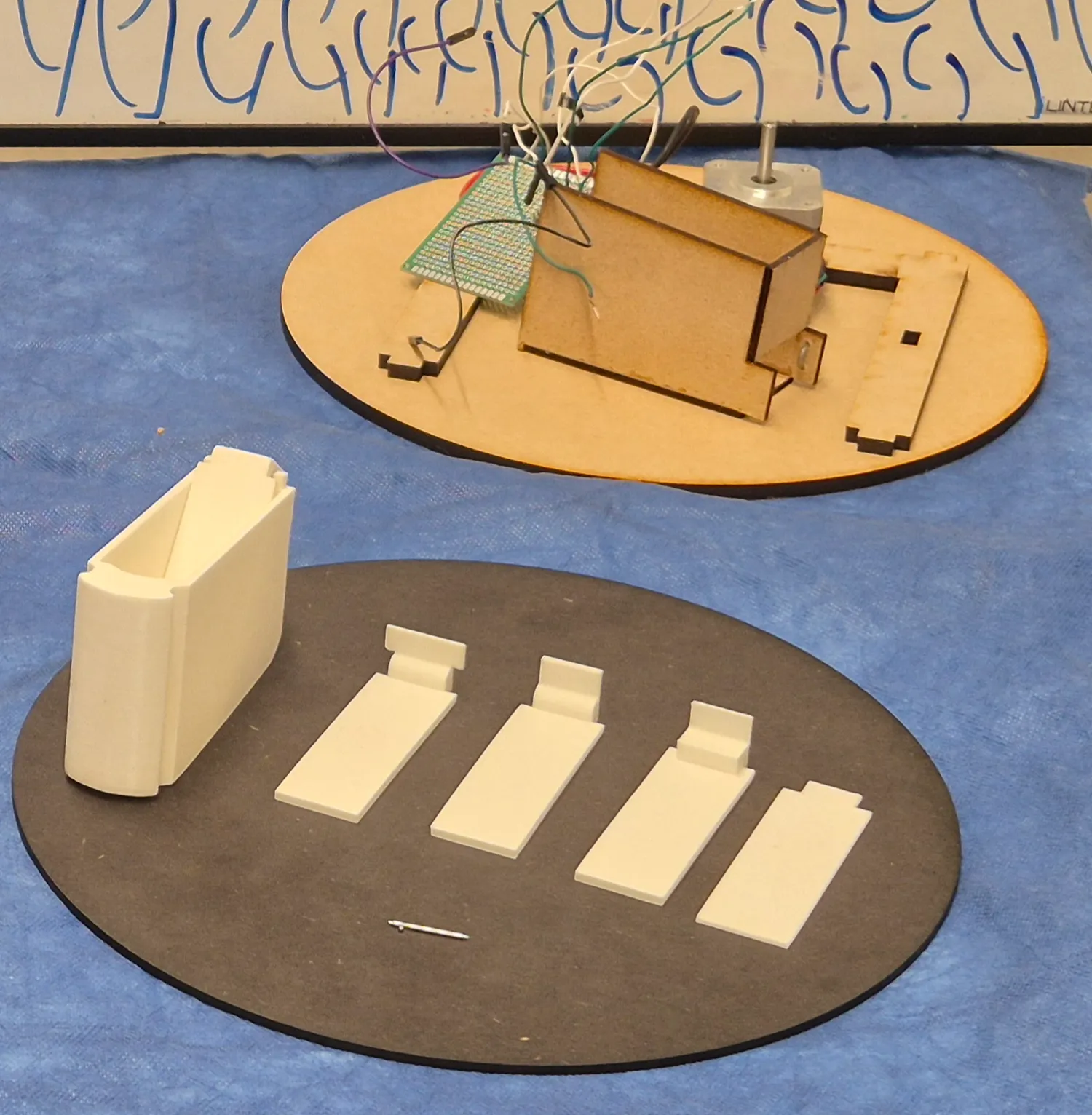 Various versions of prototypes of the cup for the machine